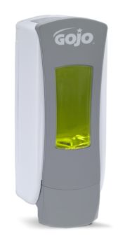 dispenser with yellow soap packet loaded